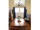 Elegant dining room with wooden furniture and natural light at 3503 Saddlebrook Dr, Loganville, GA 30052