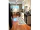 Well-lit kitchen with white cabinets, a stainless steel refrigerator, and a breakfast nook at 3503 Saddlebrook Dr, Loganville, GA 30052