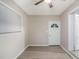 Bedroom featuring gray vinyl plank flooring, closet, and natural light from a window at 864 Northview Dr, Forest Park, GA 30297