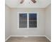 This bedroom has light-colored walls and a light wood floor and a ceiling fan at 864 Northview Dr, Forest Park, GA 30297