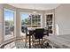 Breakfast nook features natural lighting from the bay windows at 5330 Maltdie Ct, Sugar Hill, GA 30518