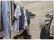 Walk-in closet with hanging racks and shelving at 5330 Maltdie Ct, Sugar Hill, GA 30518