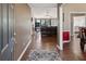 Inviting foyer that opens to a spacious living room with a fireplace and hardwood floors at 5330 Maltdie Ct, Sugar Hill, GA 30518