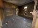 Bedroom with hardwood floors, window and walls that need work at 707 Dill Sw Ave, Atlanta, GA 30310