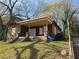 Exterior of home with grassy yard at 707 Dill Sw Ave, Atlanta, GA 30310