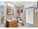 Bathroom features a vanity and walk-in shower with elegant glass door at 7725 Bold Springs Xing, Cumming, GA 30041