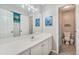 Bathroom with a white vanity and a large mirror over the sink and adjacent toilet and shower at 7725 Bold Springs Xing, Cumming, GA 30041