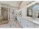 Bathroom features a large shower with a glass door and double sinks at 7725 Bold Springs Xing, Cumming, GA 30041