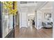 Bright foyer with hardwood floors, high ceilings, and open floor plan at 7725 Bold Springs Xing, Cumming, GA 30041