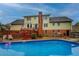 A spacious backyard features a sparkling pool, deck area, and lush green lawn, creating an inviting outdoor oasis at 802 Sugar Creek Se Dr, Conyers, GA 30094