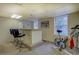 Basement area with exercise equipment, custom bar, and egress windows at 802 Sugar Creek Se Dr, Conyers, GA 30094