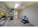 Bright basement playroom with shelving and lots of room for activities at 802 Sugar Creek Se Dr, Conyers, GA 30094