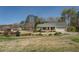 Beautiful home with a well-kept lawn, inviting porch, and neutral color scheme, creating a welcoming exterior at 802 Sugar Creek Se Dr, Conyers, GA 30094