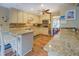 The kitchen features granite countertops, stainless steel appliances, and ample cabinet space at 802 Sugar Creek Se Dr, Conyers, GA 30094