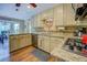 Well-equipped kitchen with granite countertops, stainless steel appliances, tile backsplash, and plenty of cabinet space at 802 Sugar Creek Se Dr, Conyers, GA 30094