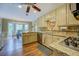 Kitchen featuring granite countertops, stainless steel appliances, and a breakfast nook with bay windows at 802 Sugar Creek Se Dr, Conyers, GA 30094