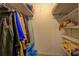 Image shows walk-in closet with shelving, great for storage at 802 Sugar Creek Se Dr, Conyers, GA 30094