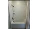 Bathroom with tiled shower-tub, shower head, and towel curtain at 1430 Dresden Dr # 225, Atlanta, GA 30319