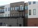 Exterior view of brick buildings with balconies and varying design features at 1430 Dresden Dr # 225, Atlanta, GA 30319