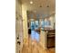 Bright living space with hardwood floors, modern lighting, and view of outdoor area through sliding glass door at 1430 Dresden Dr # 225, Atlanta, GA 30319