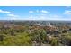 Enjoy stunning skyline views from this home near lush greenery and mature trees in an upscale Atlanta neighborhood at 2120 Sonoma Se Dr, Smyrna, GA 30080