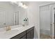 Modern bathroom with double vanity, sleek lighting, and a tub/shower combo with subway tile at 2120 Sonoma Se Dr, Smyrna, GA 30080