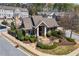 Community clubhouse showcasing its brick facade, inviting entrance, and meticulously landscaped surroundings at 2120 Sonoma Se Dr, Smyrna, GA 30080