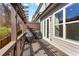 Wooden deck with pergola, railing, and two covered grills at 2120 Sonoma Se Dr, Smyrna, GA 30080