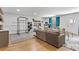 Bright living room with hardwood floors, a large couch, and fitness equipment at 2120 Sonoma Se Dr, Smyrna, GA 30080