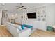 This living room showcases a built-in entertainment center, recessed lights, hardwood floors, and neutral paint at 2120 Sonoma Se Dr, Smyrna, GA 30080