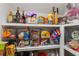 Walk-in pantry with custom shelving and ample storage for food and kitchen supplies at 2120 Sonoma Se Dr, Smyrna, GA 30080