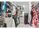Custom walk-in closet with organized shelving, ample storage, and built-in drawers at 2120 Sonoma Se Dr, Smyrna, GA 30080