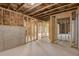 Unfinished basement showing framing and insulation, ready for customization at 3298 Rangers Gate, Marietta, GA 30062