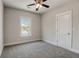 Cozy bedroom with neutral walls, plush carpet and a bright window at 3298 Rangers Gate, Marietta, GA 30062