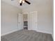 Neutral bedroom featuring plush carpet and a ceiling fan at 3298 Rangers Gate, Marietta, GA 30062