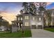 Charming two-story home featuring a welcoming front porch and an attached two-car garage at 3298 Rangers Gate, Marietta, GA 30062