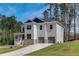 Charming two-story house boasts a well-manicured lawn and a two-car garage at 3298 Rangers Gate, Marietta, GA 30062
