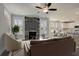 Cozy living room with stylish seating arranged around a stone fireplace at 3298 Rangers Gate, Marietta, GA 30062