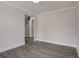 Spacious living room features a neutral color palette, hardwood floors, and crown molding at 3298 Rangers Gate, Marietta, GA 30062
