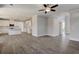 Open-concept living space with hardwood floors, recessed lighting, and a seamless flow into the kitchen at 3298 Rangers Gate, Marietta, GA 30062