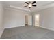 Large main bedroom features plush carpet and ensuite bathroom access through white paneled door at 3298 Rangers Gate, Marietta, GA 30062