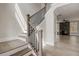 Elegant staircase with wood treads, black iron railing, and tons of natural light at 3298 Rangers Gate, Marietta, GA 30062