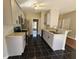 This is a modern kitchen with stainless steel appliances, gray cabinets, and granite counter tops at 79 Dogwood Ferry Ct, Lawrenceville, GA 30046