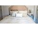 Beautifully decorated bedroom with decorative headboard and side table at 1031 Camilla Sw St, Atlanta, GA 30314