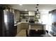 Well-lit kitchen features stainless steel appliances and breakfast bar, with pendant lighting at 1031 Camilla Sw St, Atlanta, GA 30314