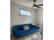 Cozy living room with bright blue couch and stylish decor at 1031 Camilla Sw St, Atlanta, GA 30314