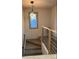 Stylish stairway with modern railing and contemporary lighting, adding a touch of elegance at 1031 Camilla Sw St, Atlanta, GA 30314