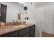 Bathroom featuring granite countertops, modern fixtures, and a bathtub with shower at 210 Woodcliff Dr, Atlanta, GA 30350