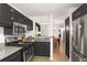 Modern kitchen boasts sleek appliances and convenient access to the dining area at 210 Woodcliff Dr, Atlanta, GA 30350