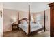 Serene main bedroom features a canopy bed and soothing decor at 210 Woodcliff Dr, Atlanta, GA 30350